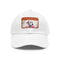 Dalmatian pattern white baseball cap with light brown rectangular patch.
