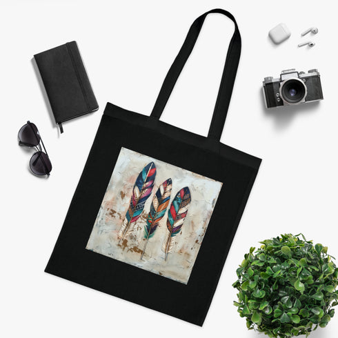 Bohemian feather print black cotton tote bag with whimsical charm.