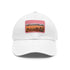 Desert landscape cotton baseball hat in white with light brown patch.