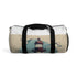 Coastal lighthouse dream duffel bag with hand-drawn waves design.