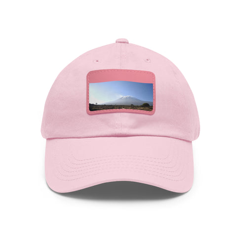 White cotton hat with light brown rectangle patch for Kilimanjaro adventure.