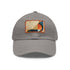Abstract geometric white baseball cap with light brown patch.