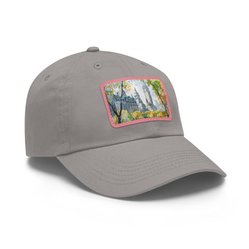 Central Park watercolor baseball cap with iconic landmarks and lush greenery.
