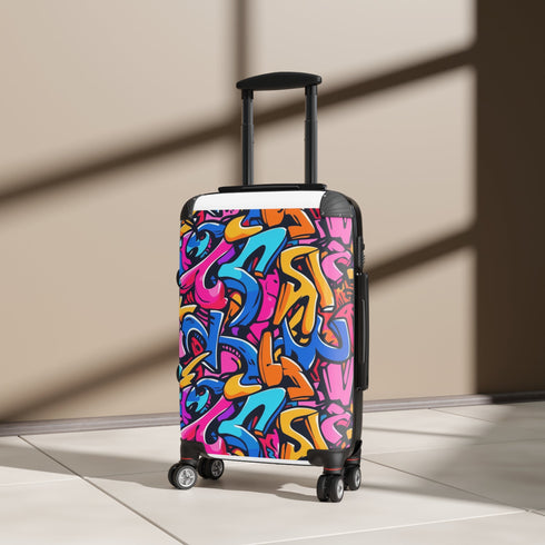 Vibrant neon graffiti suitcase set in small black for stylish travelers.
