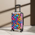 Vibrant neon graffiti suitcase set in small black for stylish travelers.