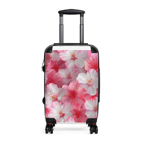 Cherry blossom black small suitcase with pink and white design.