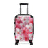 Stylish pink and white Cherry Blossom small suitcase with black trim.