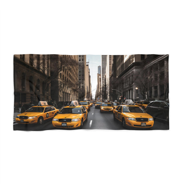 NYC Cab beach towel with yellow cabs speeding down busy streets.