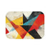 Modern geometric bath mat in vivid colors for stylish bathroom decor.