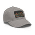 Aztec pattern white hat with light brown rectangle patch.