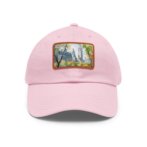 Central Park watercolor baseball cap in white with light brown patch.