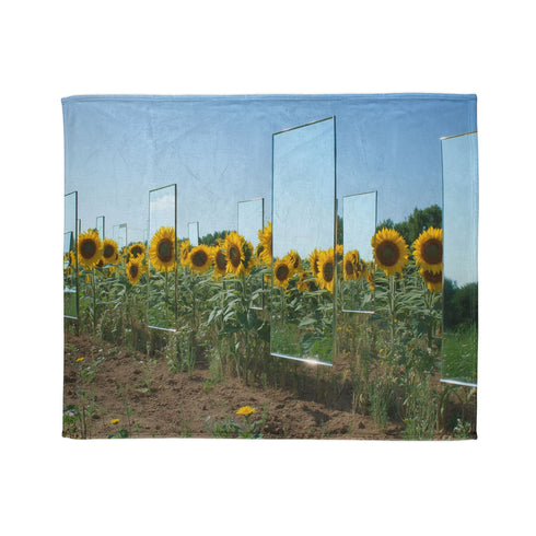 Sunflower Field with Floating Mirrors — Plush Fleece Throw Blanket — Draped Over Sofa & Bed Lifestyle View