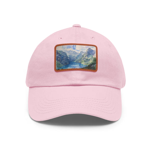 Swiss Alps watercolor baseball cap with light brown patch.