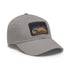 Abstract white cotton cap with textured light brown horse patch.