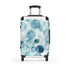 Ocean Blue Eyes Suitcase: Small Black Travel Bag with Eye Pattern.