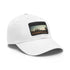 White baseball cap with light brown Angkor Wat tribute design.