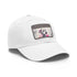 White Dalmatian baseball cap with light brown patch and puppy design.