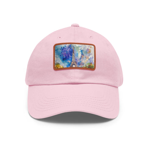 White cotton baseball cap with Eiffel Tower watercolor design.