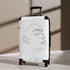 Chic small black face suitcase with minimalist line art design.