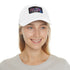 White Mushroom Magic Trucker Hat with Light Brown Rectangle Patch.