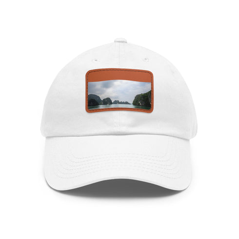 White cotton unisex hat with light brown patch and rectangle shape