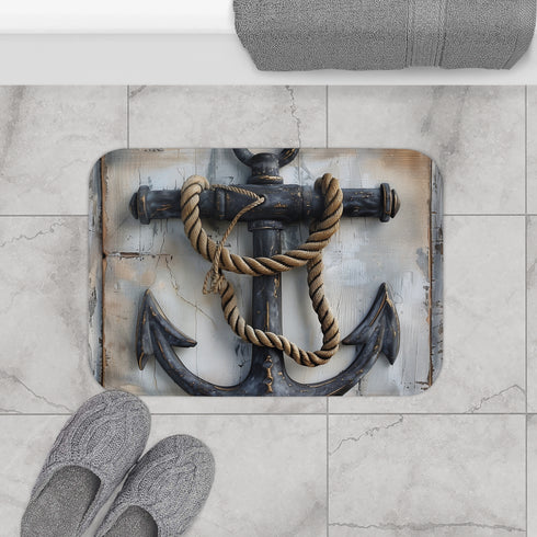 Nautical-inspired anchor bath mat with rope design.