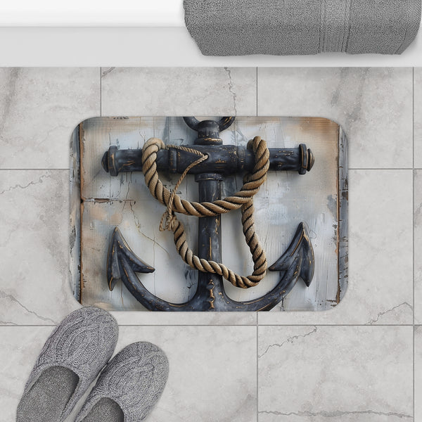 Nautical-inspired anchor bath mat with rope design.