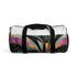 Abstract art deco duffel bag, vibrant geometric print, stylish travel essential.