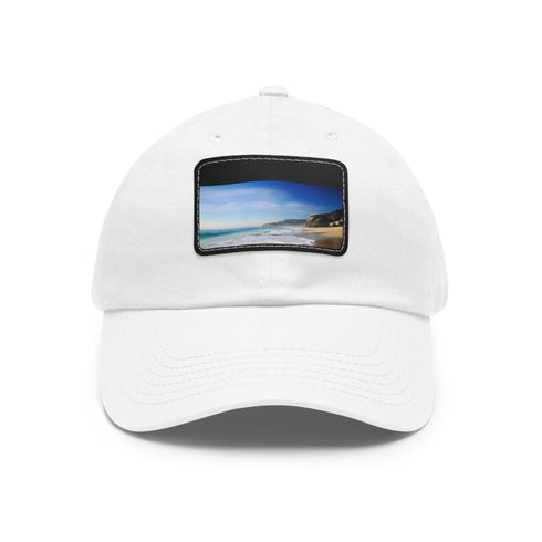 White cotton baseball cap with Malibu Beach image patch for sunny days.