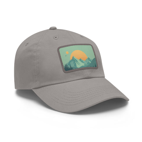 Mountain landscape baseball cap in white with light brown patch.