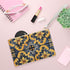 Artistic artisan tile clutch bag with traditional pattern for elegance and style.