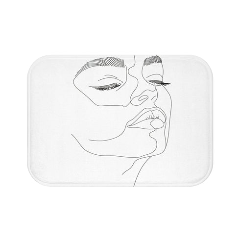 Alt text: Abstract Visage Bath Mat - Minimalist bath mat featuring a line art representation of a human face, adding artistic expression and contemporary style to your bathroom. Size: 24 x 17. High-quality, comfortable, and perfect for all seasons. Makes a great gift. Shop more at BenCPrints.