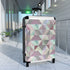 Chic pastel geometric small black suitcase for travel accessories.
