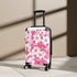 Cherry blossom patterned small black travel suitcase: stylish spring accessory.