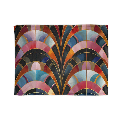 Art Deco geometric patterned blanket for cozy rest and sleep.