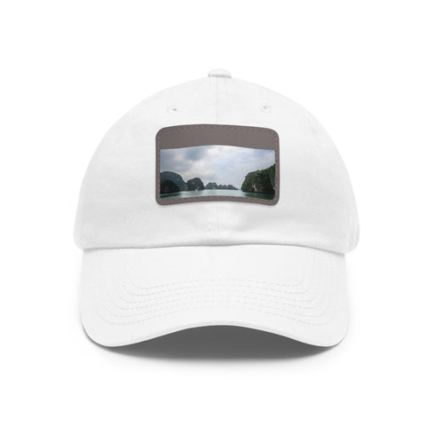 Unisex cotton hat in white with light brown patch, rectangle shape.