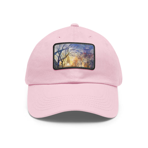 Eiffel Tower watercolor baseball cap with light brown patch.