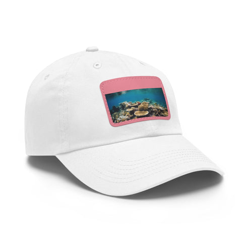 White cotton baseball cap with Great Barrier Reef coral reef design.