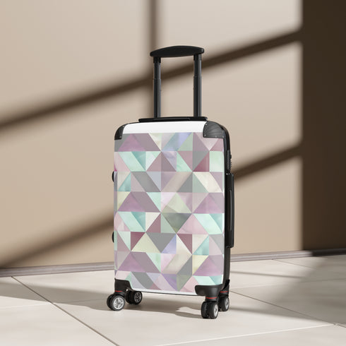 Chic pastel geometric small black suitcase, perfect for stylish travelers.