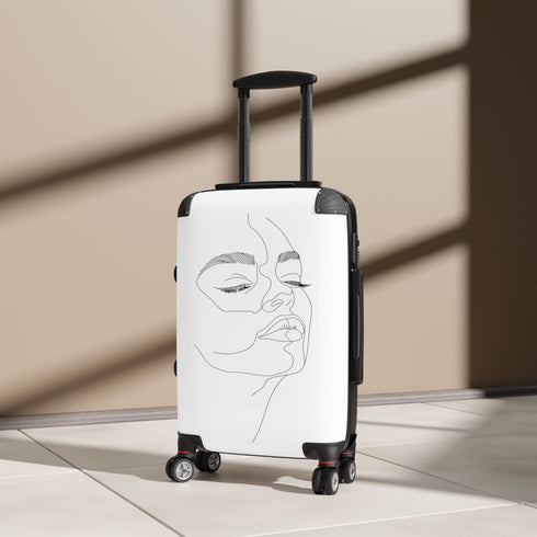 Chic minimalist black small suitcase with line art faces for travel.