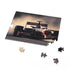 Colorful F1 racing jigsaw puzzle with high-speed cars and intense competition.
