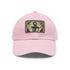 Nautical anchor and rope baseball cap in white with light brown patch.