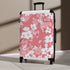 Cherry blossom small black travel suitcase with pink and white pattern.