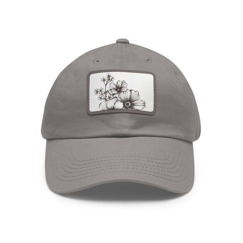 Hand-drawn floral white rectangle baseball cap with light brown patch design.