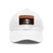 White cotton baseball cap with light brown rectangular patch.