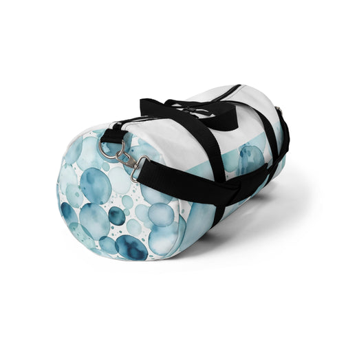 Eye-catching Blue Water Duffel with mesmerizing watercolor eyes pattern.