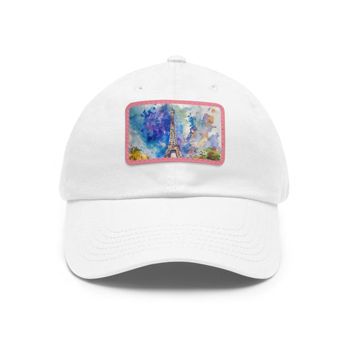 Eiffel Tower watercolor baseball cap in white with light brown patch.