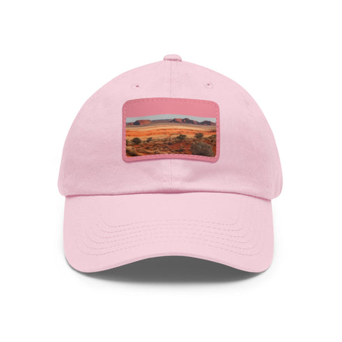 Desert landscape rock-themed baseball cap in white with light brown patch.