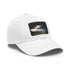 White baseball cap with light brown patch featuring Icelandic Adventure.