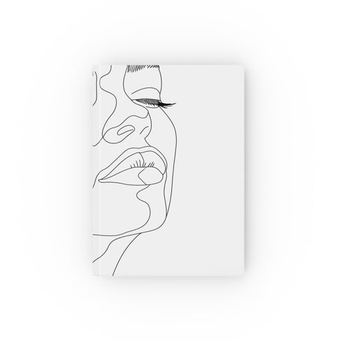 Minimalist line art journal with elegant face design. High-quality, versatile, and stylish. Great for journaling or sketching. Makes a perfect gift. Explore simplicity with Expressive Strokes journal.